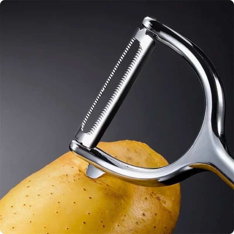 Eplucheur de pomme de terre retire impuretée avec ergo.