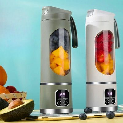 Blender mini posé à côté d'un autre mini mixeur