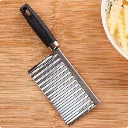 Coupe frite manuel ond'ine posé sur une table