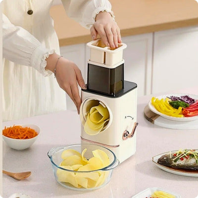 coupe légumes électrique blanc tranche des pommes de terre.