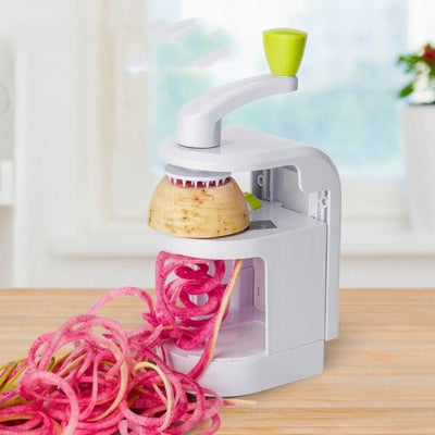 coupe legumes en spirale spaguett'ine avec fillamment de légumes devant 