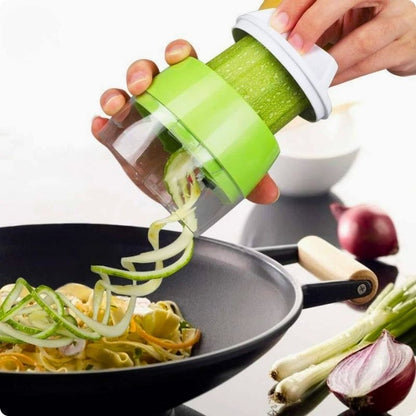 Coupe légumes spirale spira perfect'ine utilisé pour trancher courgette dans poêle