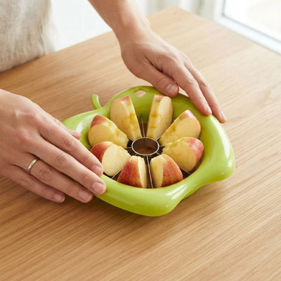 Coupe pomme​ vert utilisé pour couper une pomme