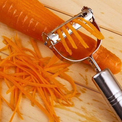 économe à julienne july'ine posé sur carotte avec julienne de carotte à côté