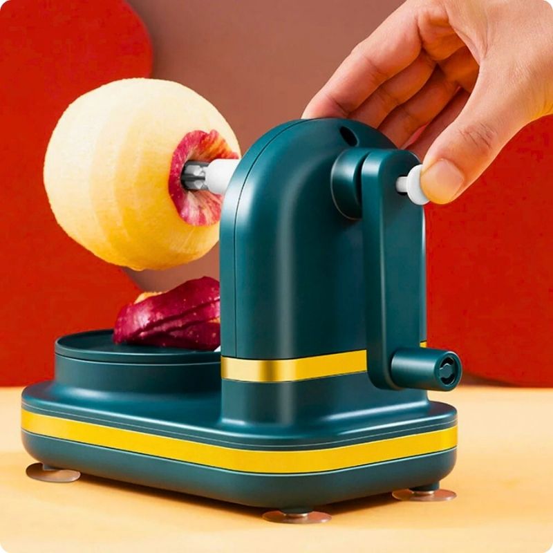 Éplucheuse à pomme avec bouton permettant de retirer pomme.