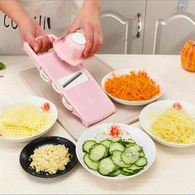 mandoline cuisine cuisine mandol'ine rose à côté assiette légumes