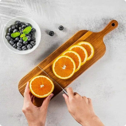 planche à découper bois rectangle nature utilisée pour couper pamplemousse
