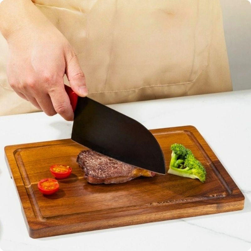 Planche à découper en bois utilisée pour couper viande