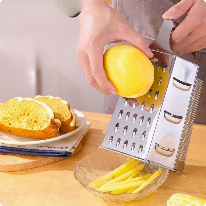 Râpe legumes manuelle utilisée pour râper pomme de terre.